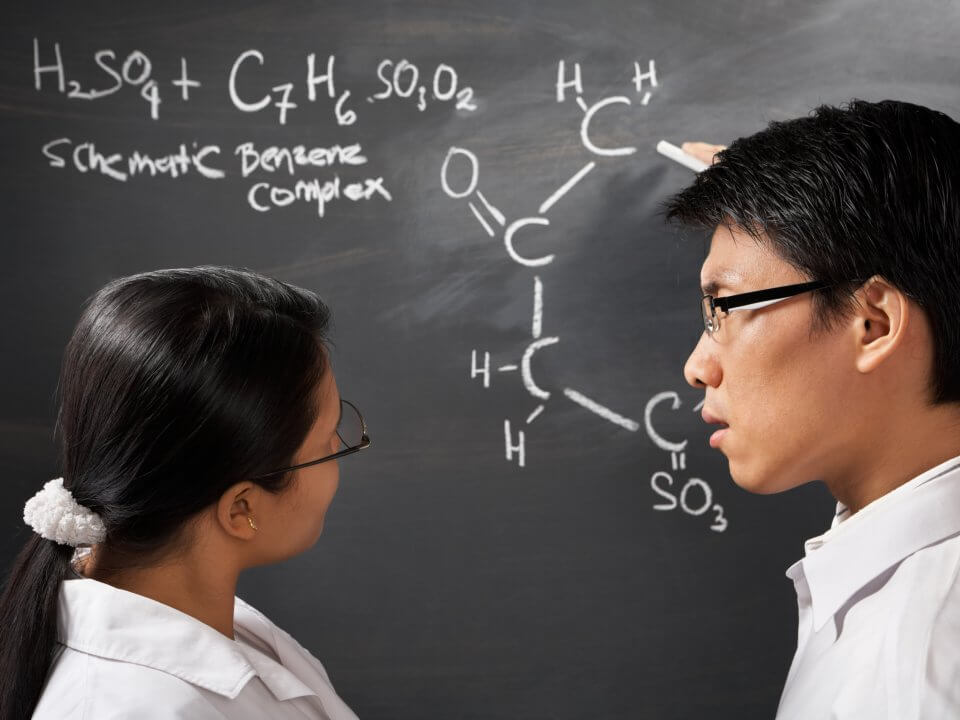 students analysing chemistry equation