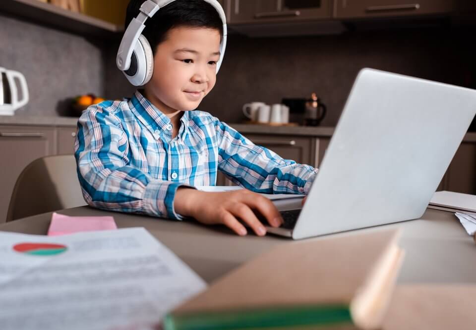 Asian boy online studying